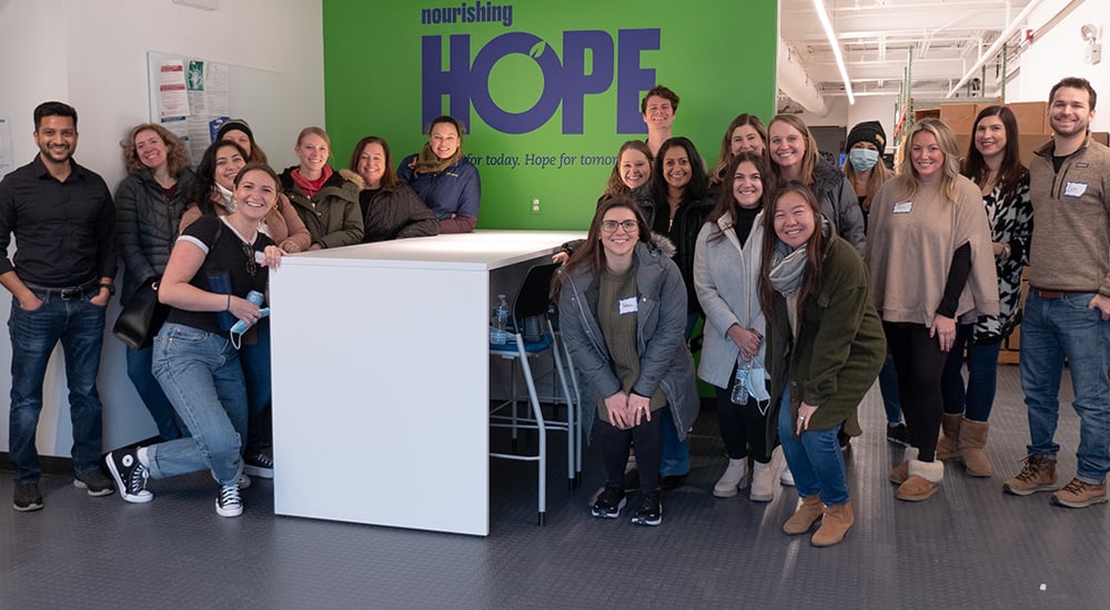 WellRight employees volunteering at a Nourishing Hope event