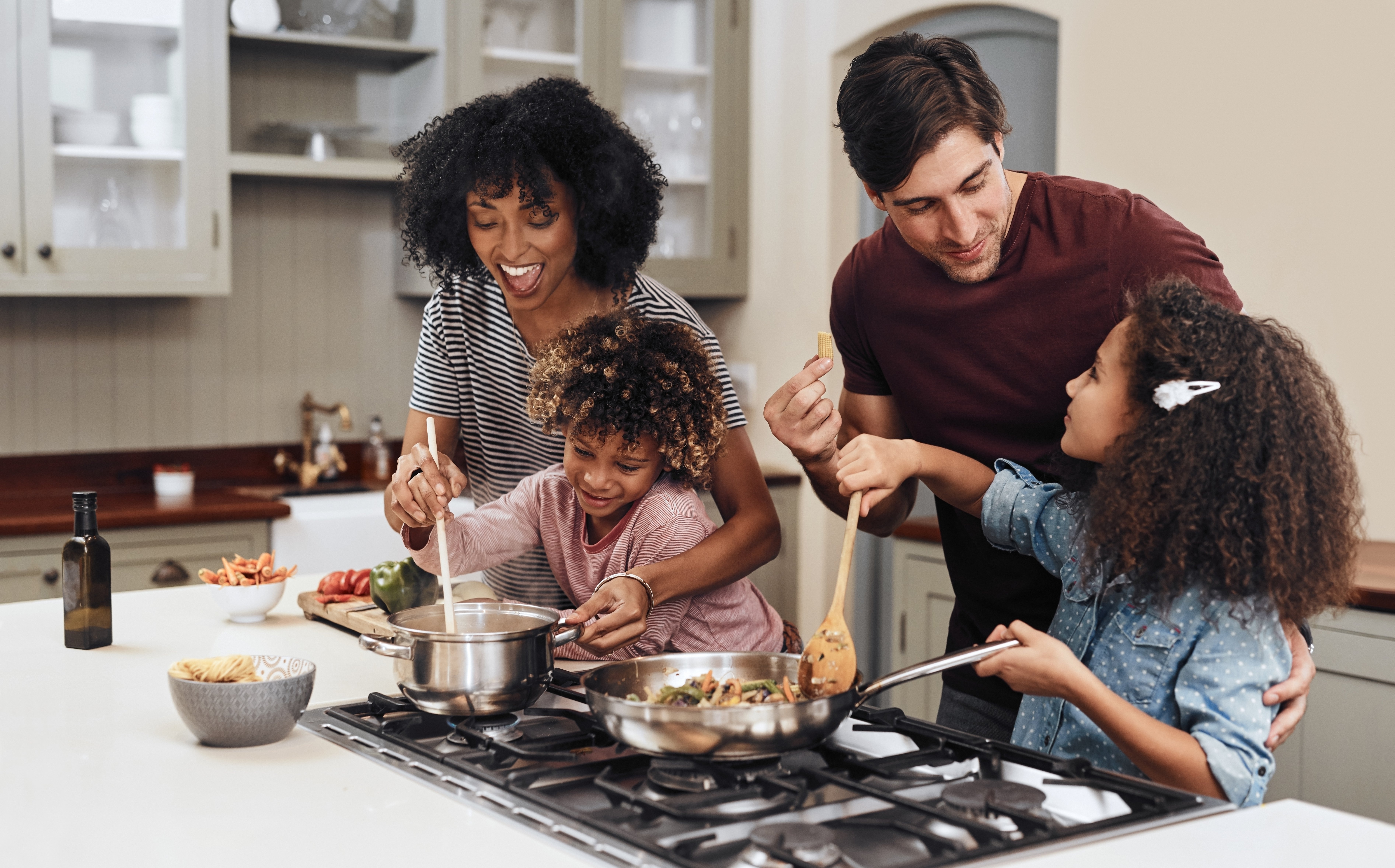 A family makes dinner together
