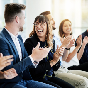 Business-woman-celebrating-with-colleagues